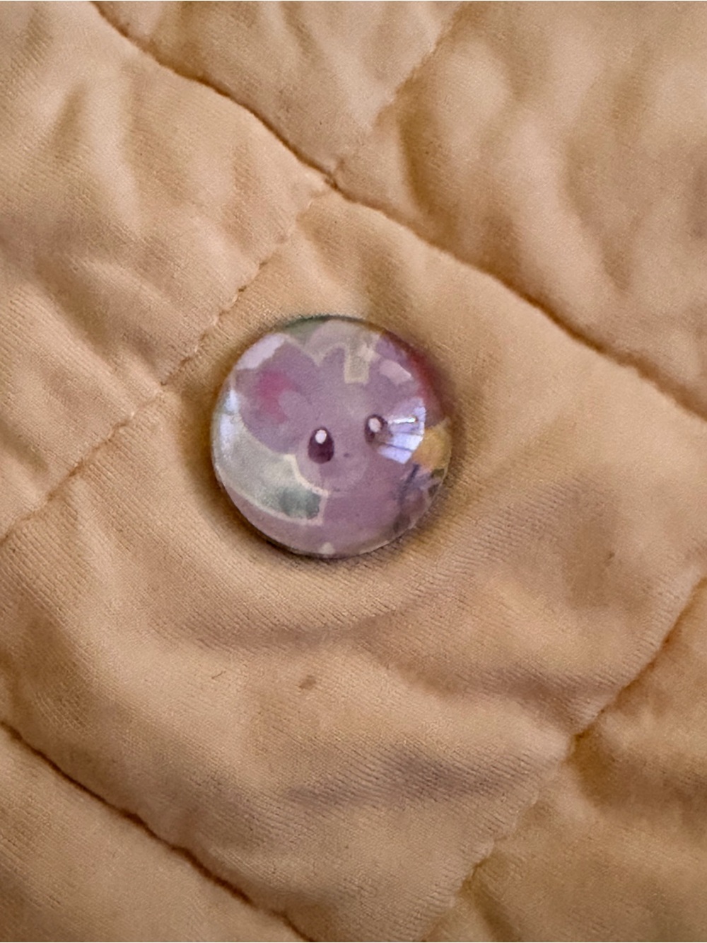 Pokemon Cream Quilted Puffer Jacket with Purple Accent Button